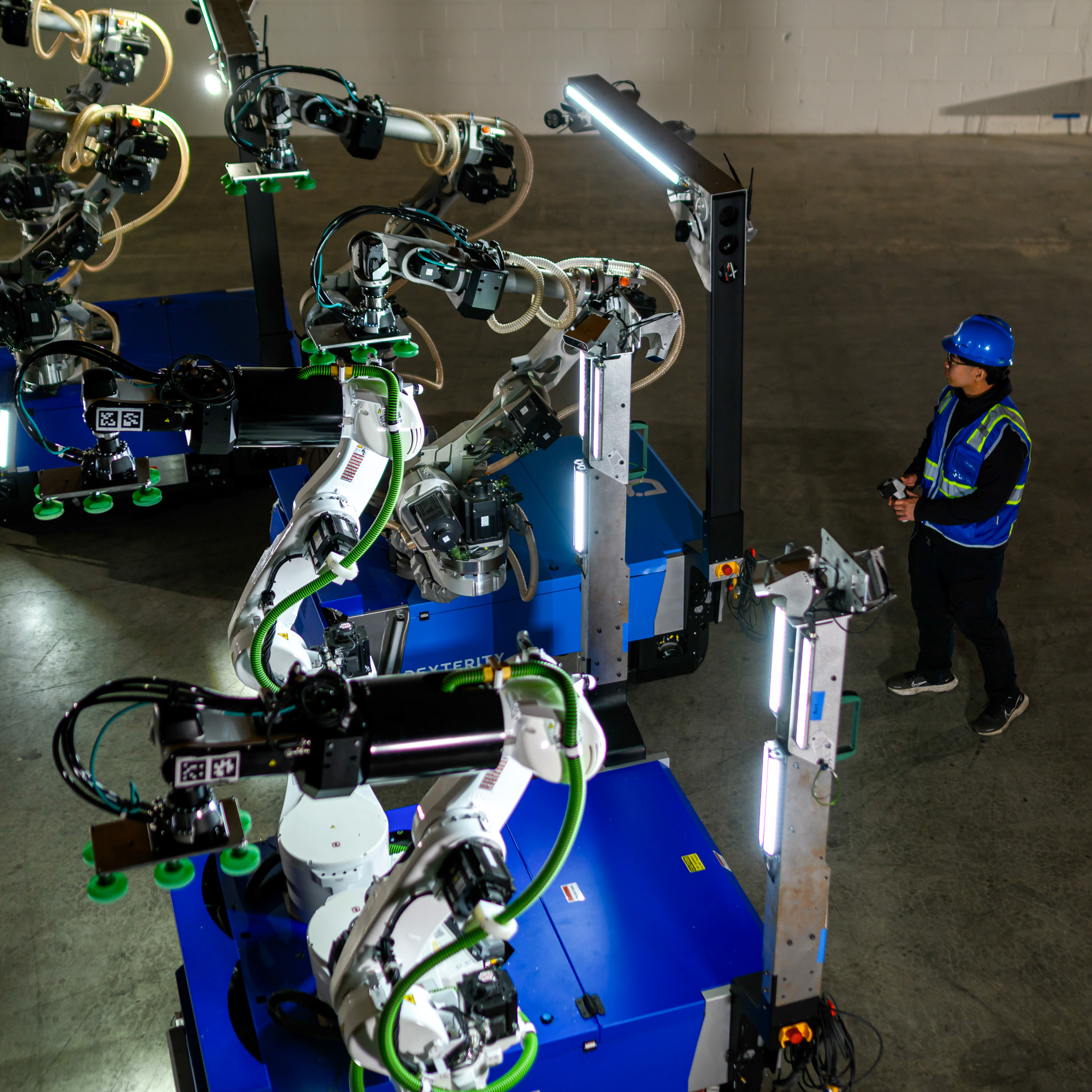 Mech on its rover base, shown with an operator