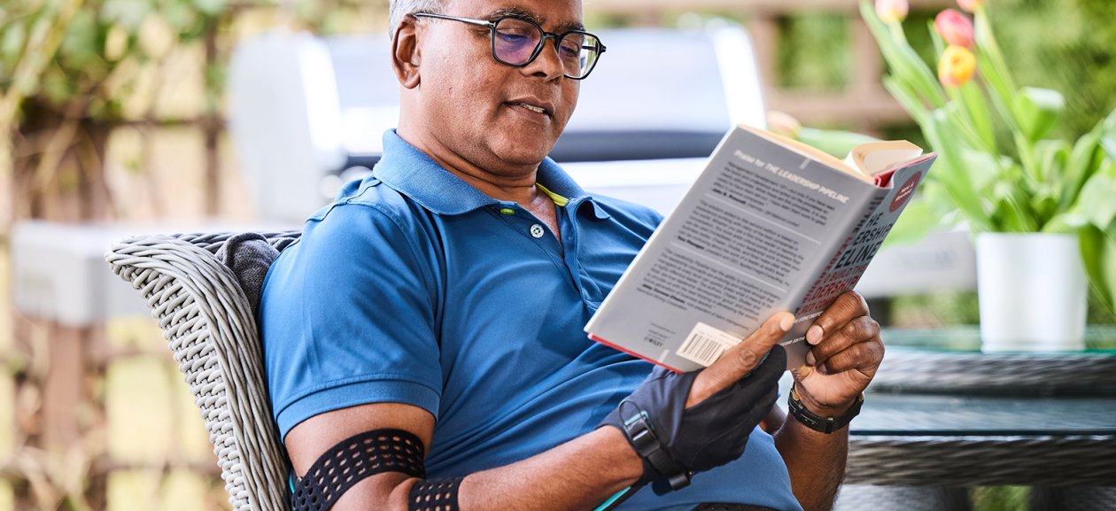 User reading with Carbonhand and power unit