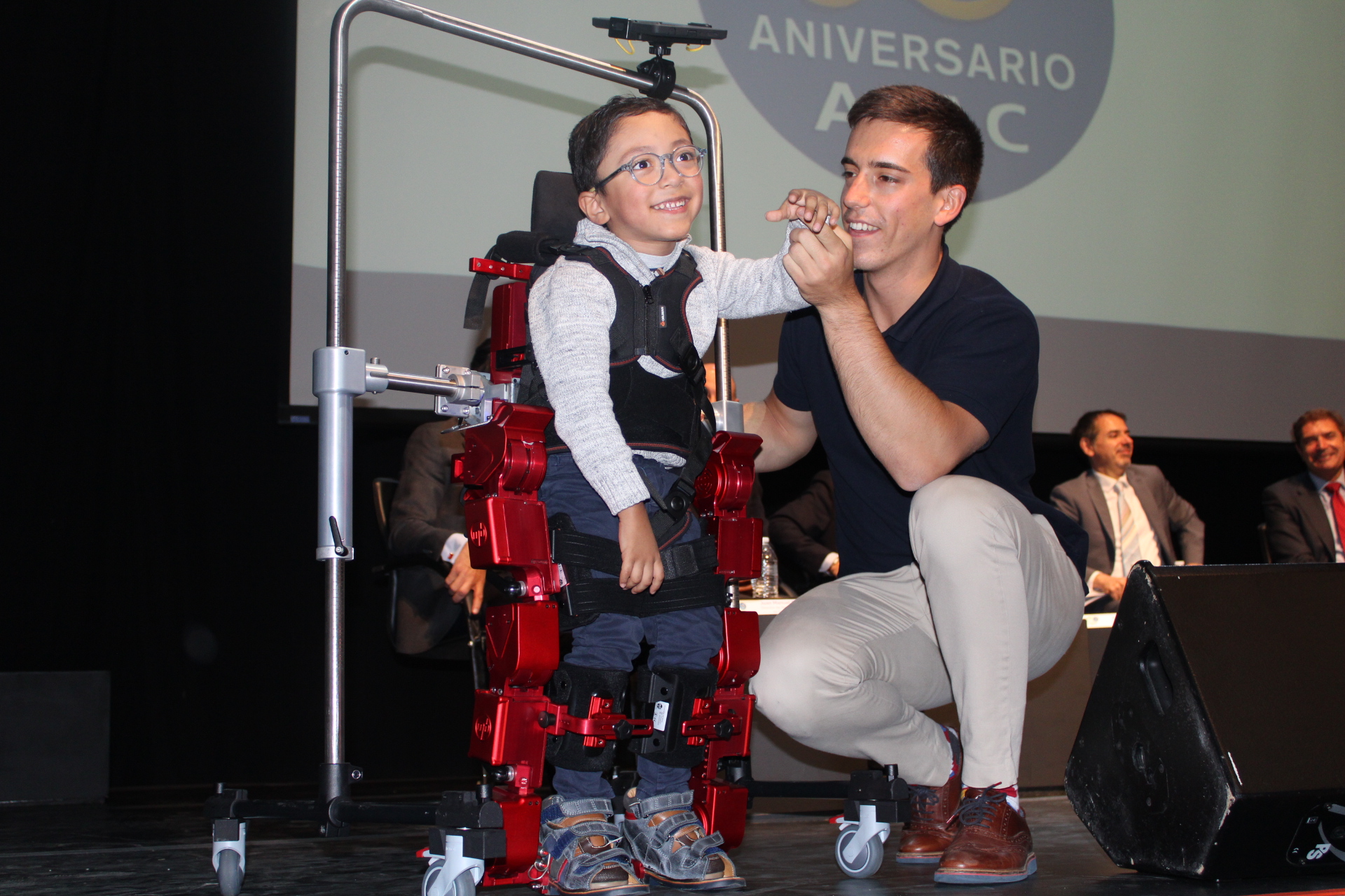 Child standing in ATLAS 2030 on stage