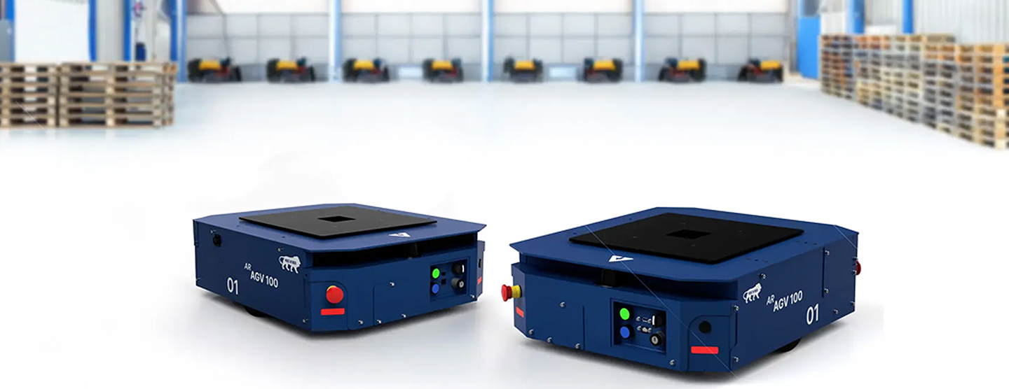AGV 100 robots in a warehouse