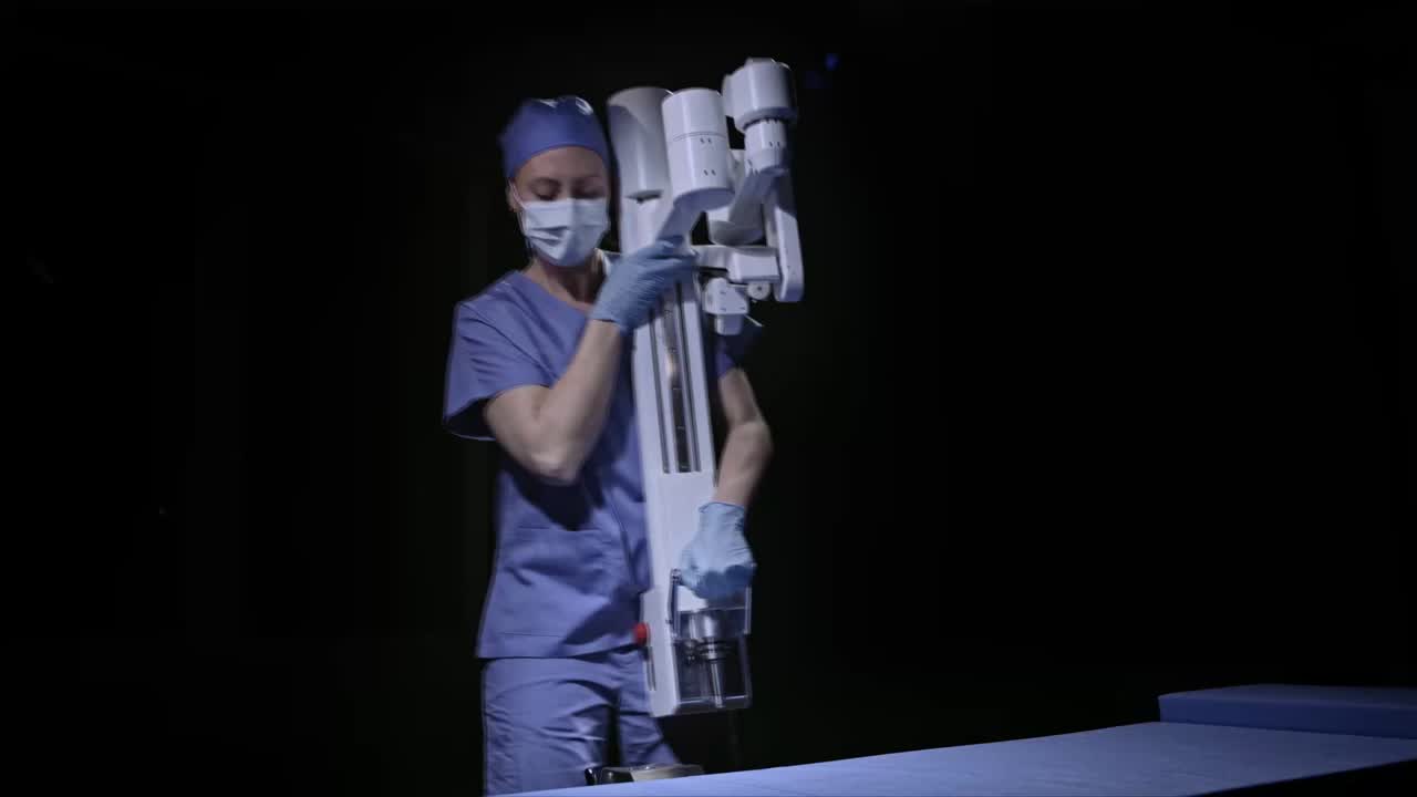 Surgeon moving the Revolve platform at the operating table